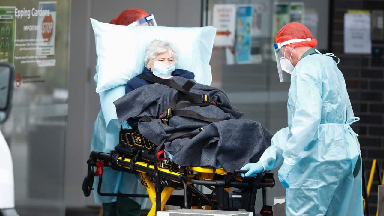 A resident is taken away in an ambulance from Epping Gardens Aged Care Facility in Epping, Melbourne, Tuesday, July 28, 2020.