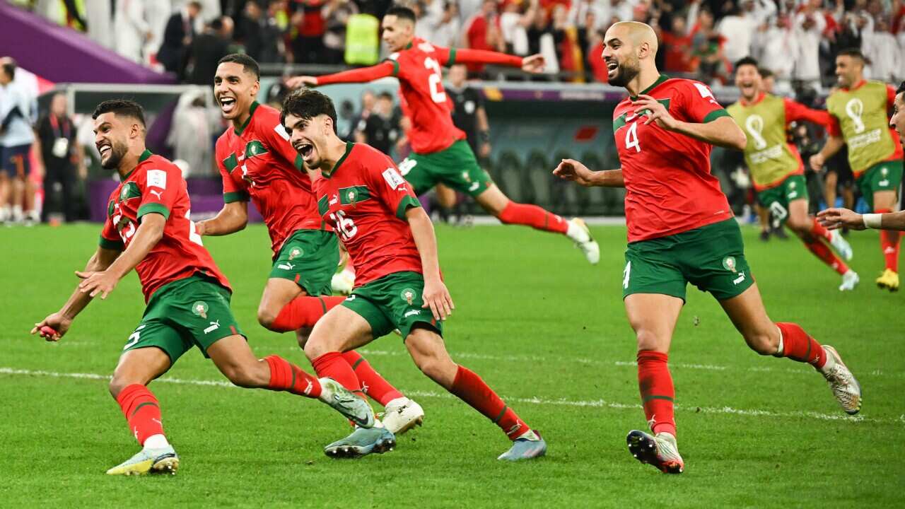 Morocco players celebrate at full time after defeating Spain on penalties during Morocco v Spain match of the Fifa World Cup Qatar 2022 at Education City Stadium in Doha, Qatar on December 6, 2022.