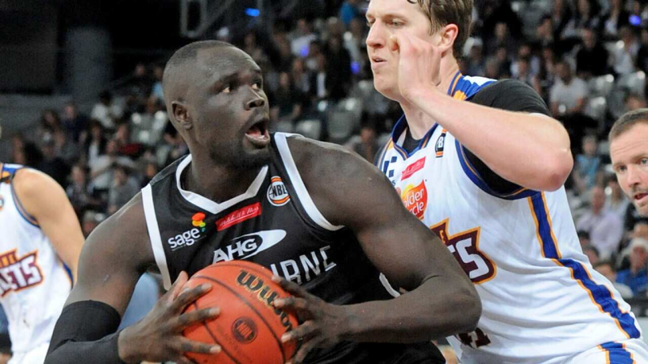 Brisbane Bullets centre Cameron Bairstow (R)