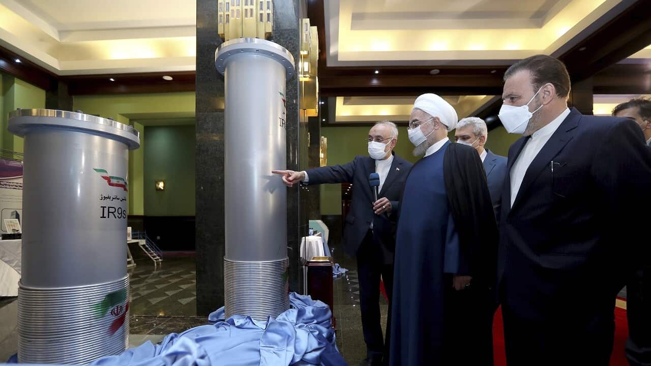 President Hassan Rouhani visiting an exhibition of Iran's nuclear achievements in Tehran, Iran, Saturday, April 10, 2021.agreement.