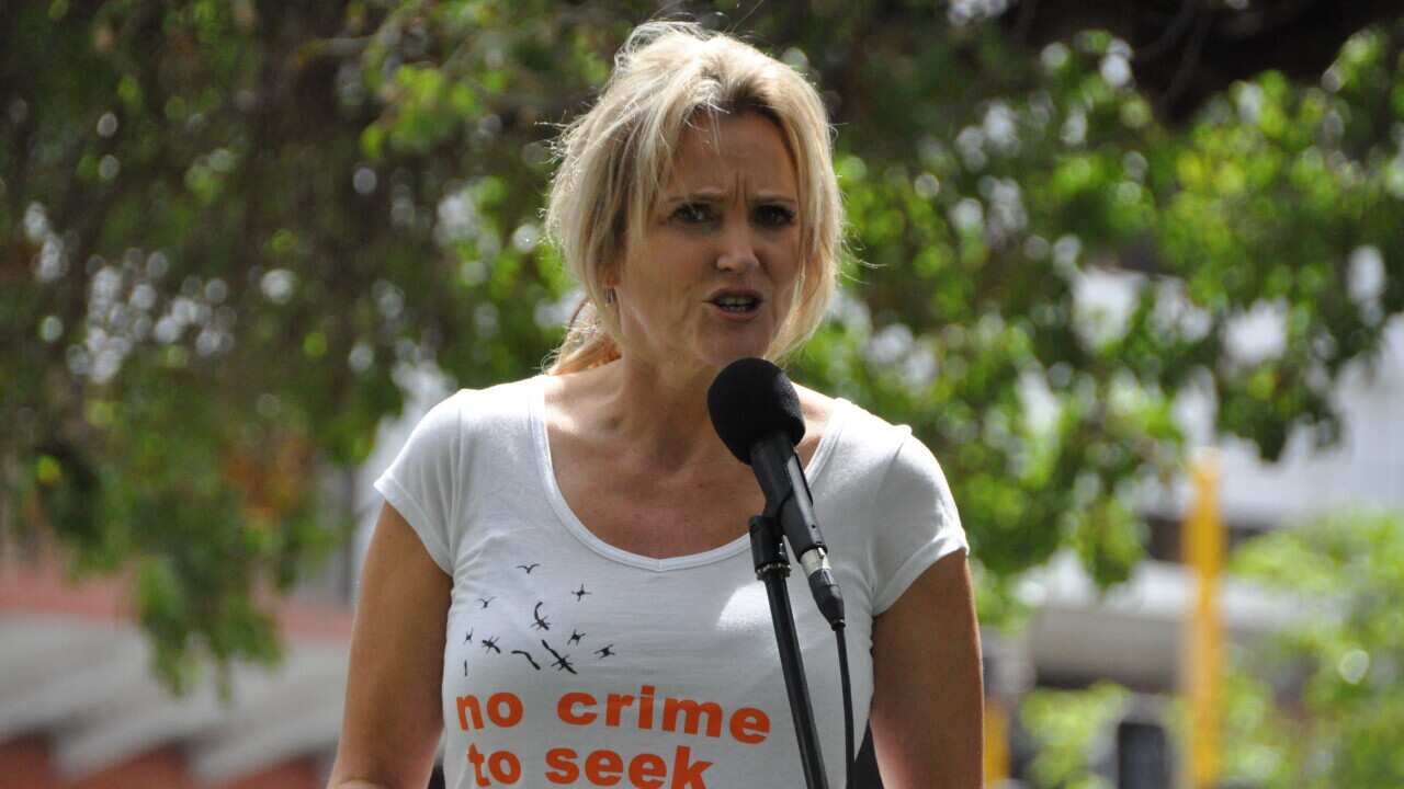 Federal Labor MP Melissa Parke speaks to the March In March rally in Perth on Sunday. March 22, 2015. An estimated 500 people attended the event. (AAP/Sarah Motherwell) NO ARCHIVING