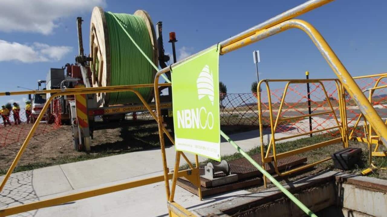 A fibre optic cable is seen rolled out in Gungahlin.