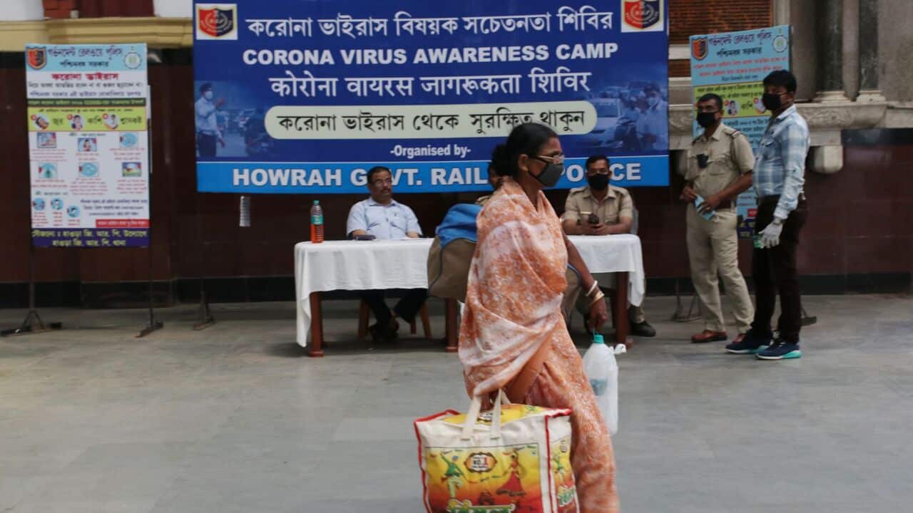 Passengers waiting Railway Platform. All Train Cancelled during a one-day Janata (civil) curfew imposed as a preventive measure against the COVID-19 coronavirus