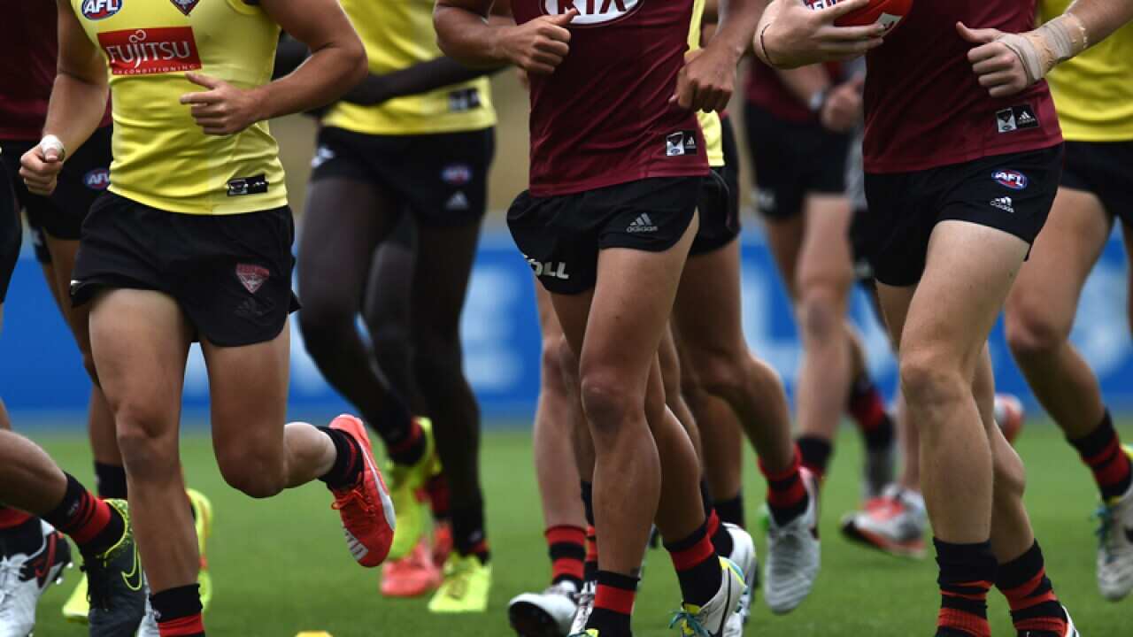 Essendon players during a training session