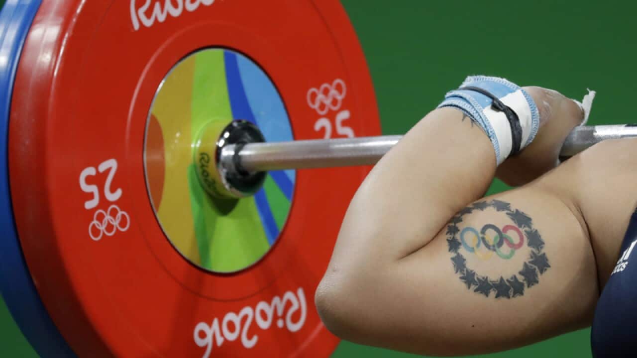 A weightlifter during the 2016 Olympics