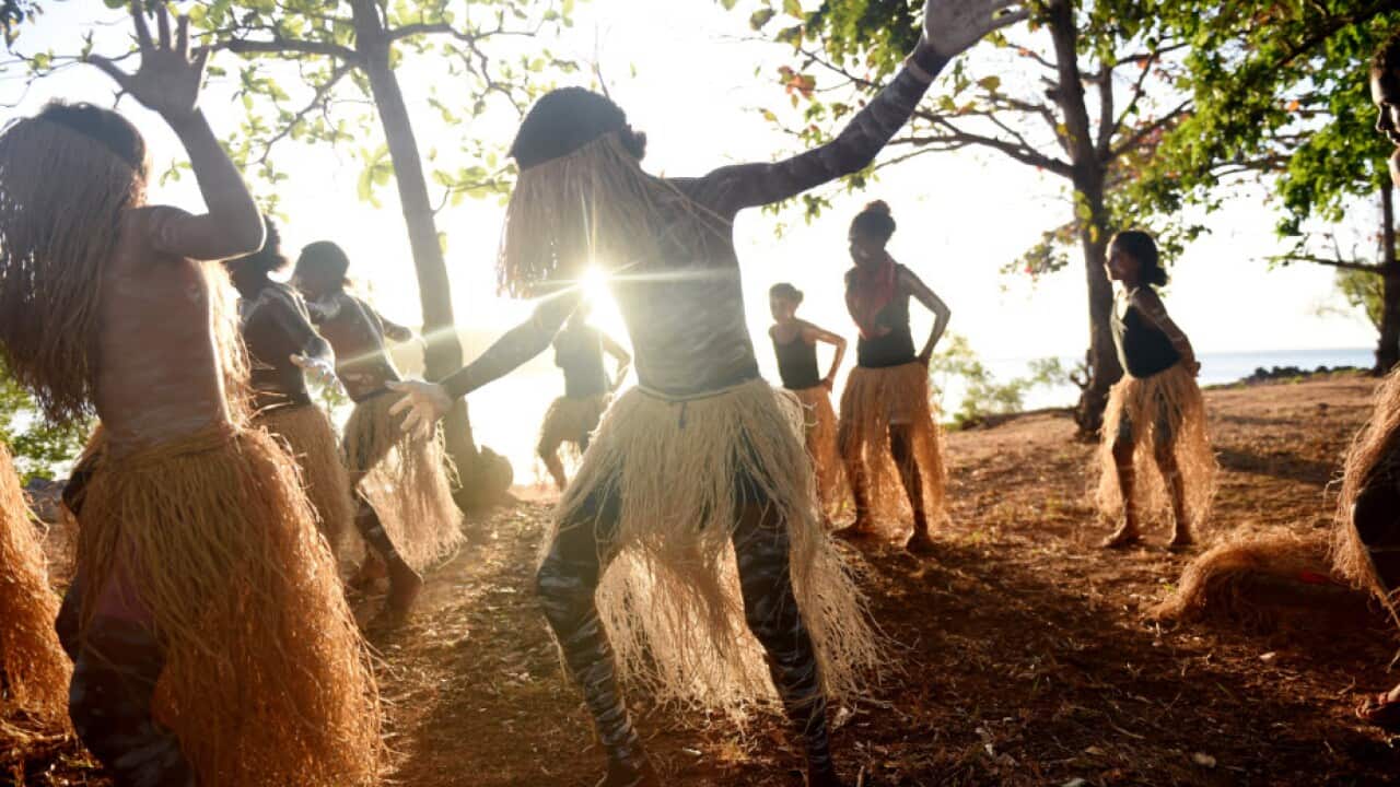 The Injinoo Dance Group rehearse before performing during a welcome to country ceremony for Australian Prime Minister Tony Abbott in Bamaga.