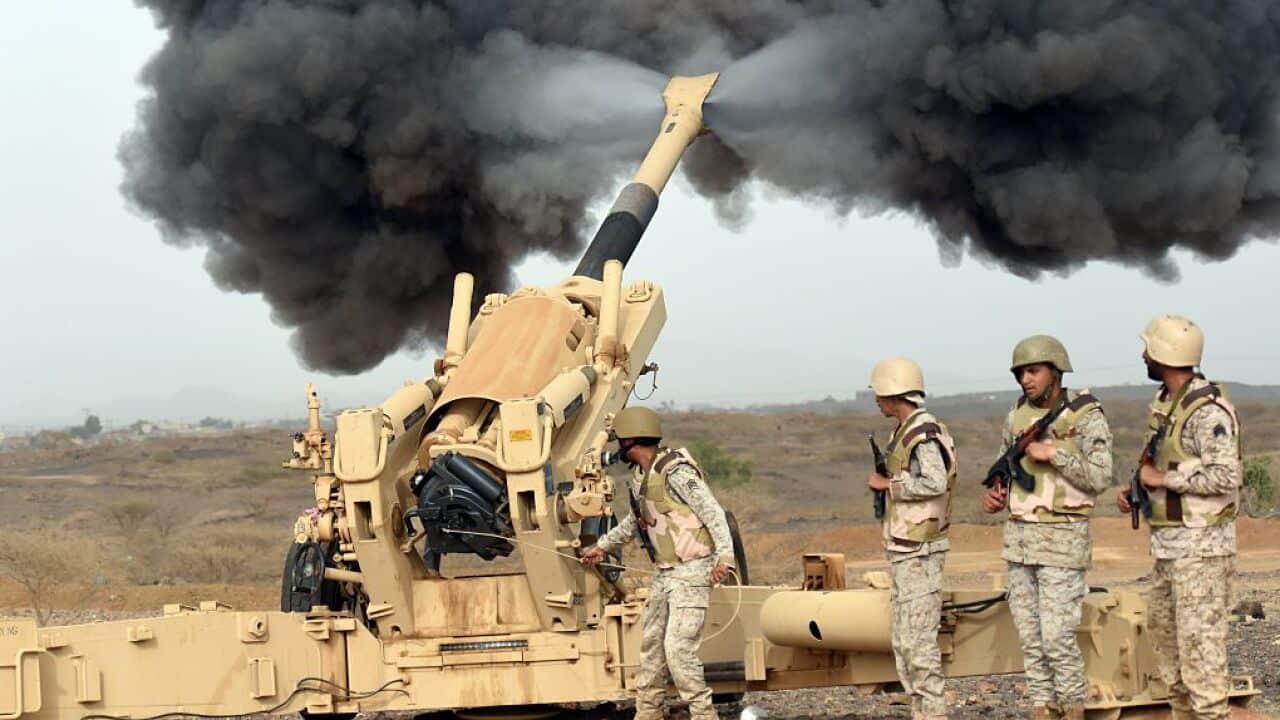 Saudi army artillery fire shells towards Yemen from a post close to the Saudi-Yemeni border.