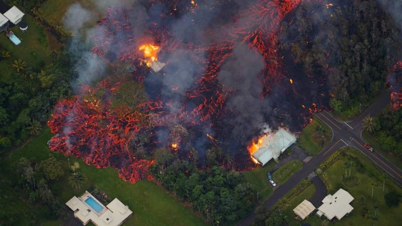 Lava flows into a residential estate in Hawaii