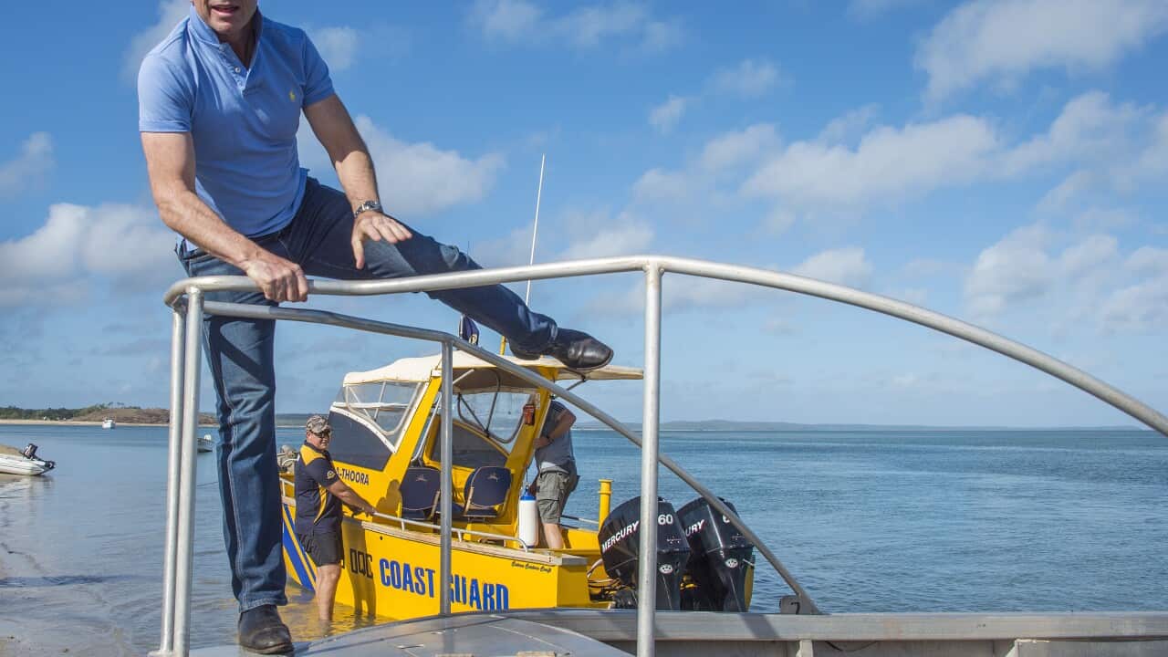 Prime Minister Tony Abbott boards the ranger boat for the trip to the mouth of the Jardine River with indigenous Apudthama Land and Sea Rangers on Friday, August 28, 2015.