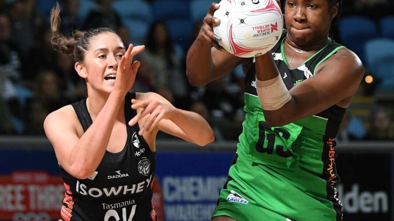 Jhaniele Fowler of the Fever (R) and Matilda Garrett contest the ball