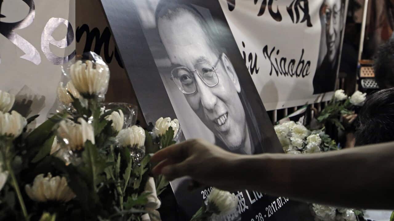 Tributes to jailed Chinese Nobel Peace laureate Liu Xiaobo during a demonstration outside the Chinese liaison office in Hong Kong.
