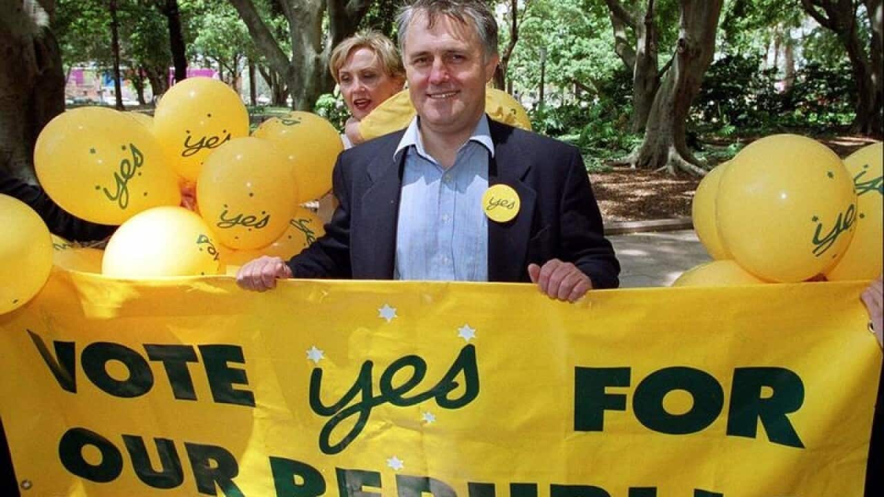 Malcolm Turnbull with a Republic poster