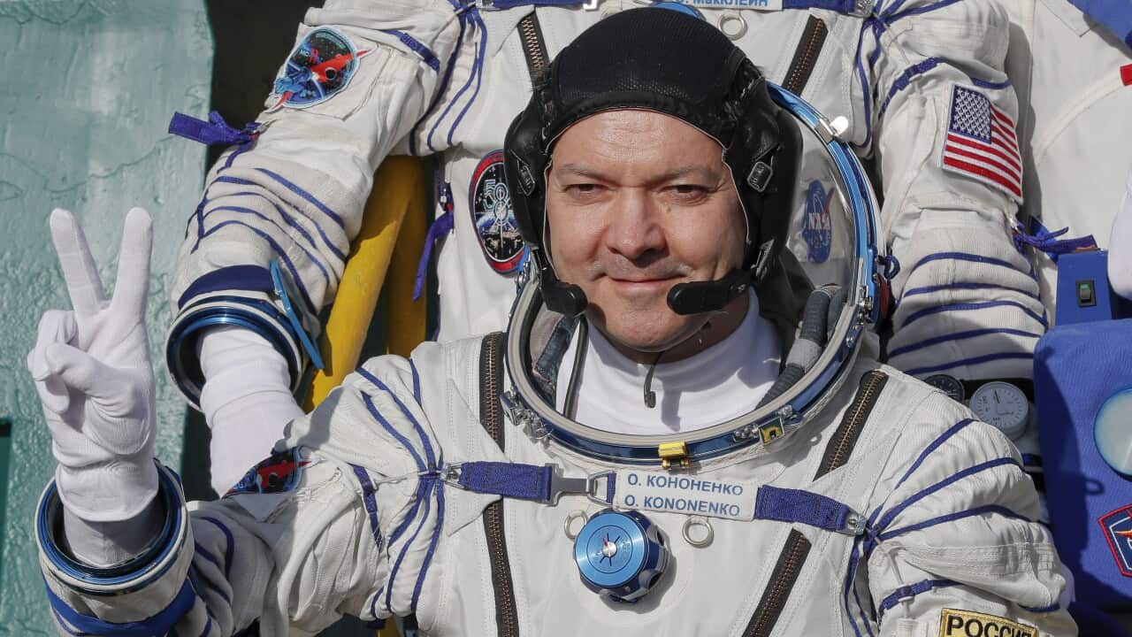 Russian cosmonaut Oleg Kononenko as he boards the Soyuz ship, bound for the ISS.