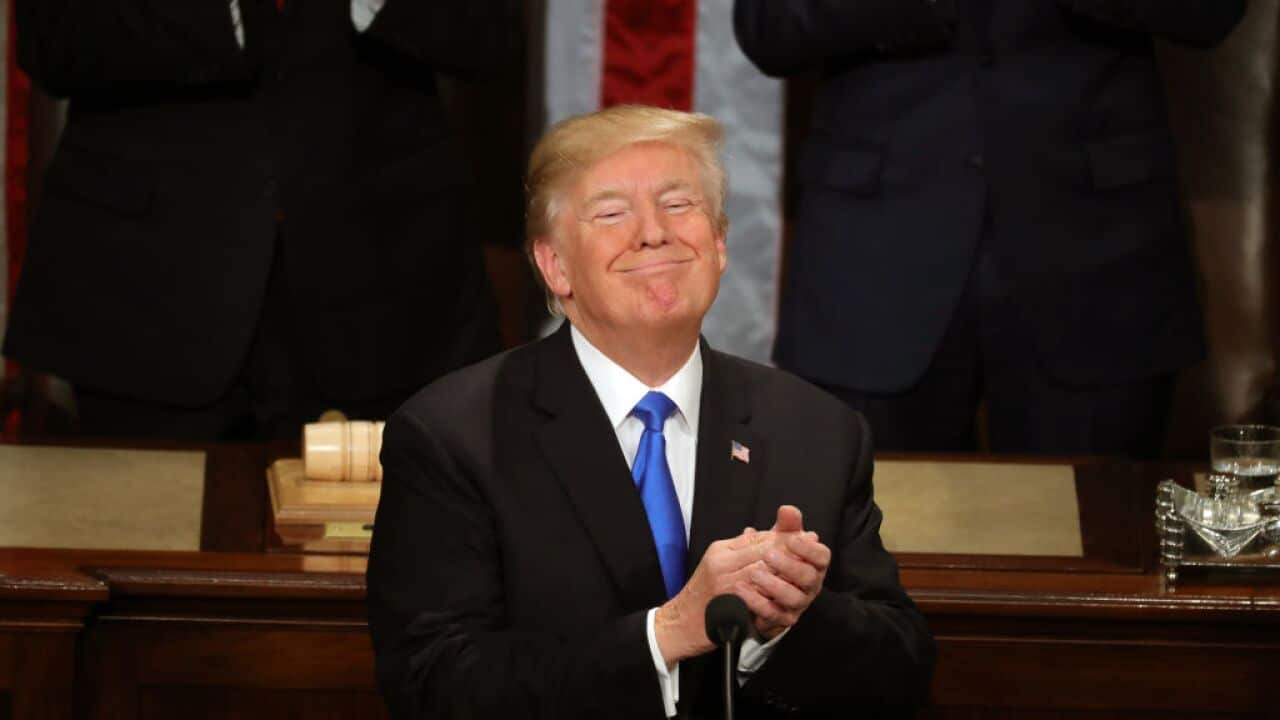Donald Trump claps during the State of the Union address in the chamber of the US House of Representatives on 30 January, 2018.