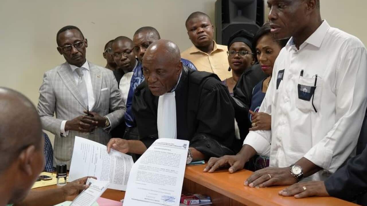 Martin Fayulu (R) with lawyers