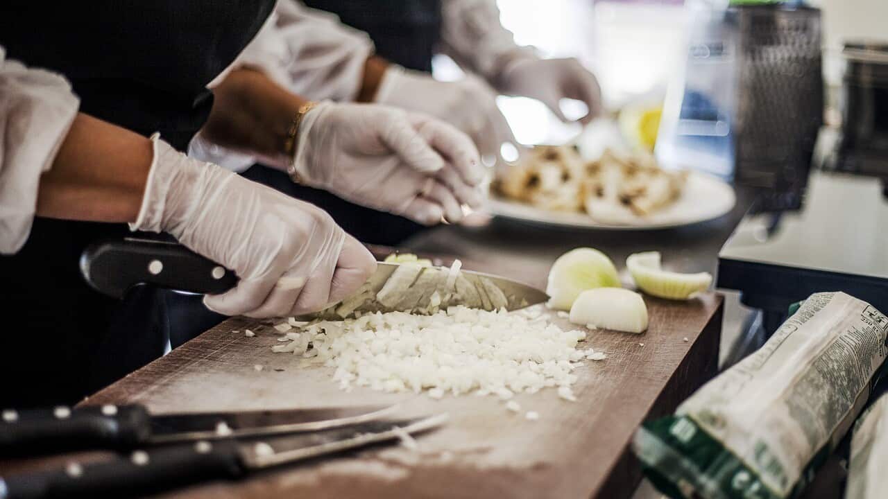 Representative image of a chef in a restaurant.