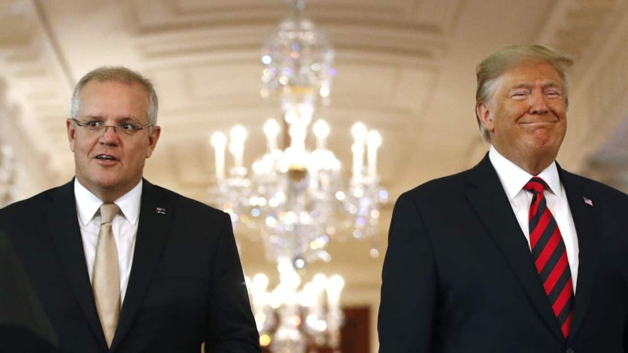 President Donald Trump and Australian Prime Minister Scott Morrison arrive at a news conference in the East Room of the White House, Friday, Sept. 20, 2019, in Washington. (AP Photo/Patrick Semansky)