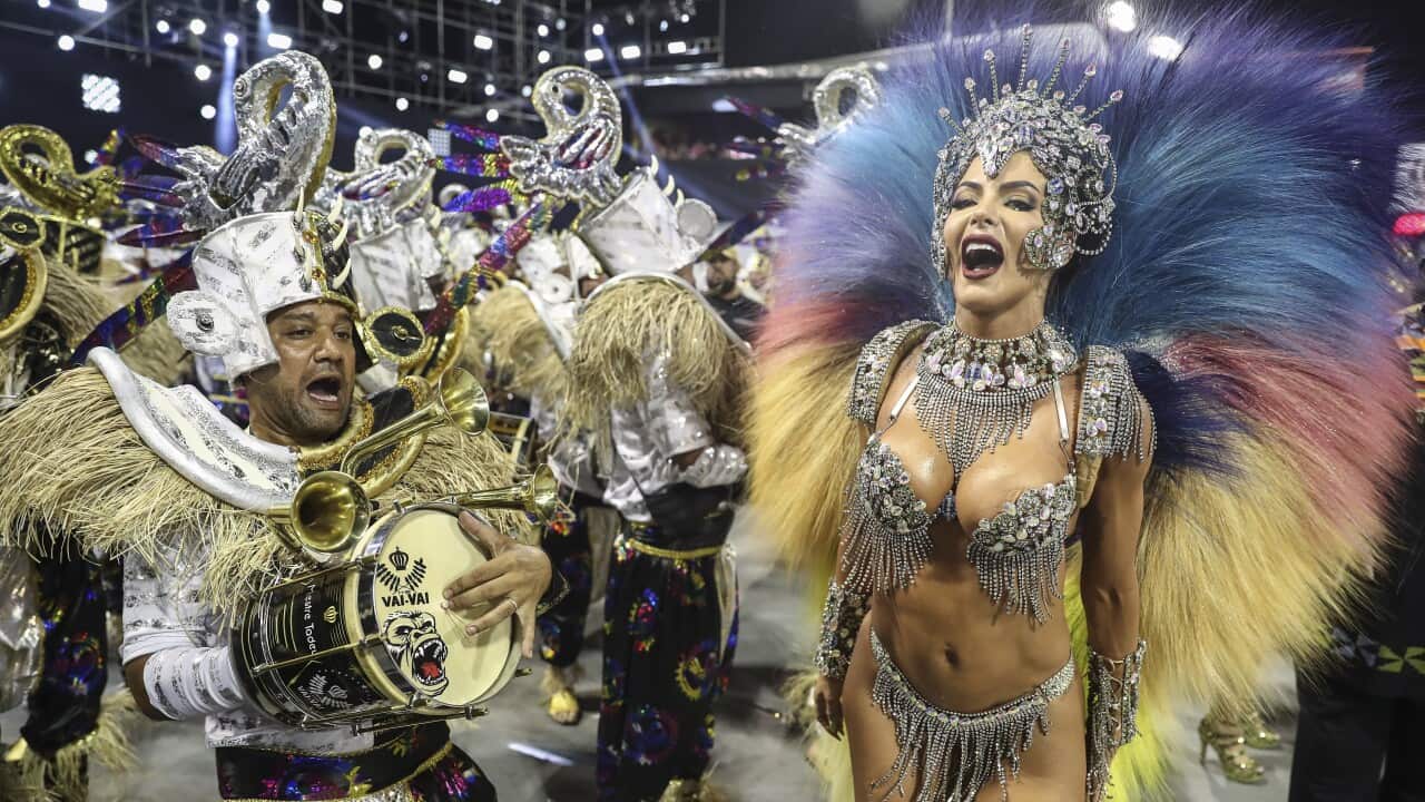 Members of the samba school of the Vai-Vai Special Group parade during the second day of carnival celebrations at the Anhembi Sambadrome in Sao Paulo, Brazil, 23 April 2022.