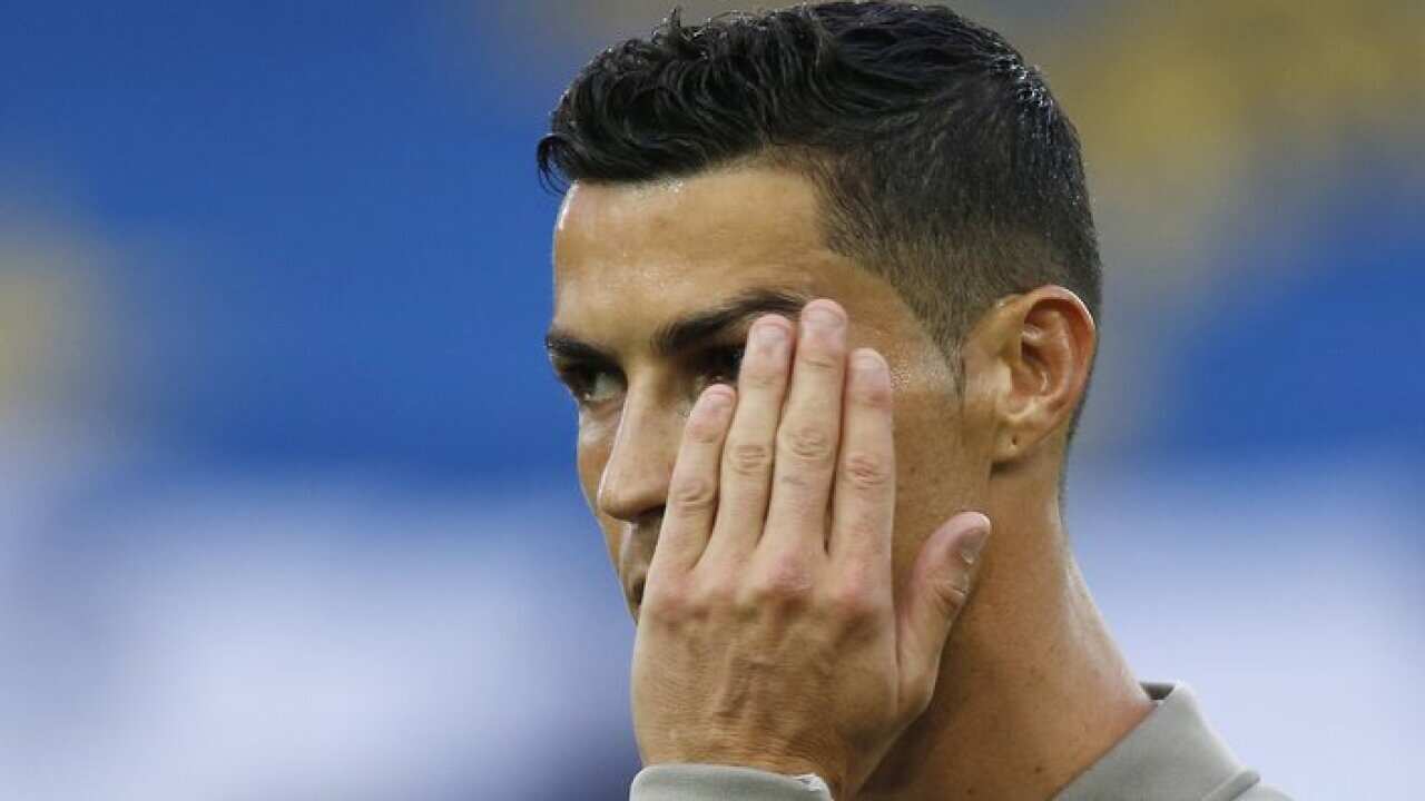 Juventus' Cristiano Ronaldo stands prior to the start of the Serie A soccer match between AC Udinese and Juventus