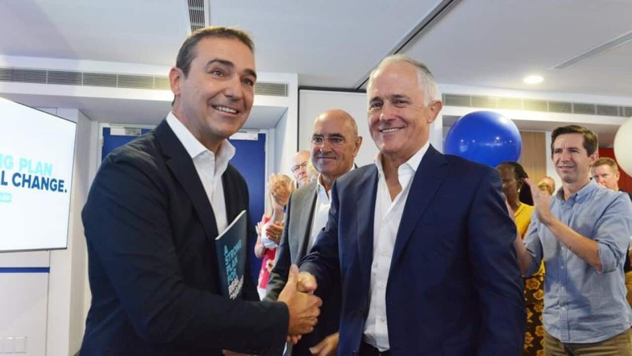 Stgeven Marshall (left shakes hands with Malcolm Turnbull