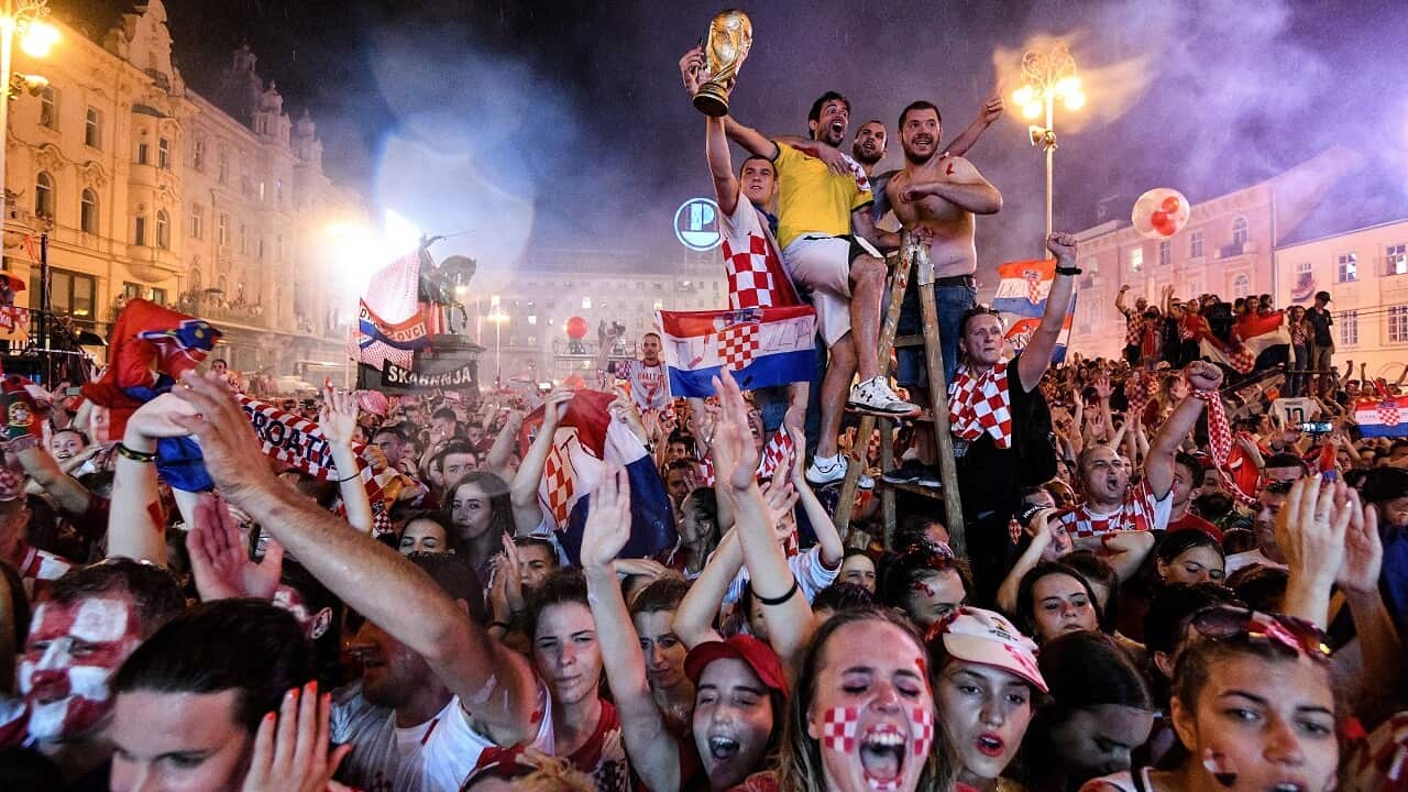 Supporters of the Croatian national football team celebrate in Bana Jelacica Square in Zagreb.