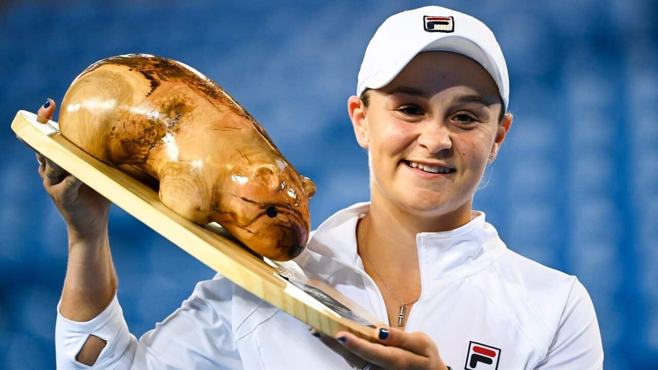 Ashleigh Barty of Australia poses with the trophy after winning the Yarra Valley Classic - WTA 500 final match against Garbine Muguruza.