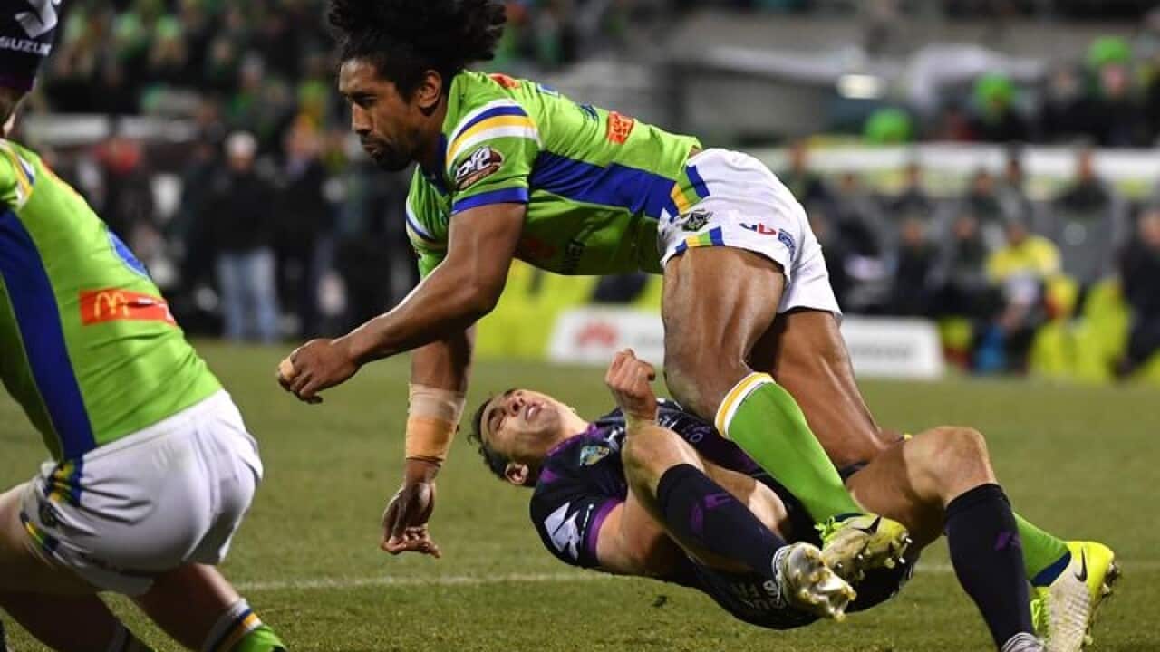 Billy Slater cops a knock.