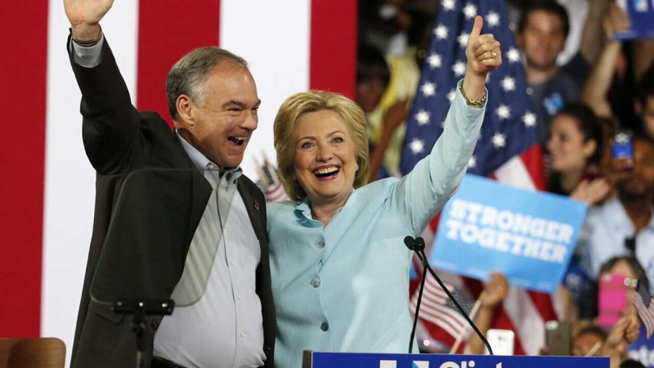 Hillary Clinton (R) Vice Presidential candidate Tim Kaine (L)