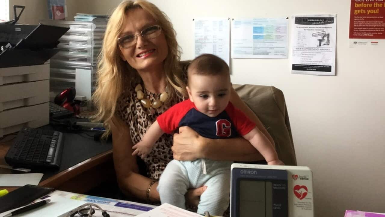 Dr.Anna Kucminska with her little patient