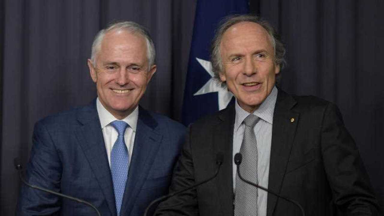 Australian Prime Minister Malcolm Turnbull (left) and newly appointed Chief Scientist Dr Alan Finkel speak to the media during a press conference at Parliament House in Canberra, Tuesday, Oct. 27, 2015. (AAP Image/Lukas Coch) NO ARCHIVING