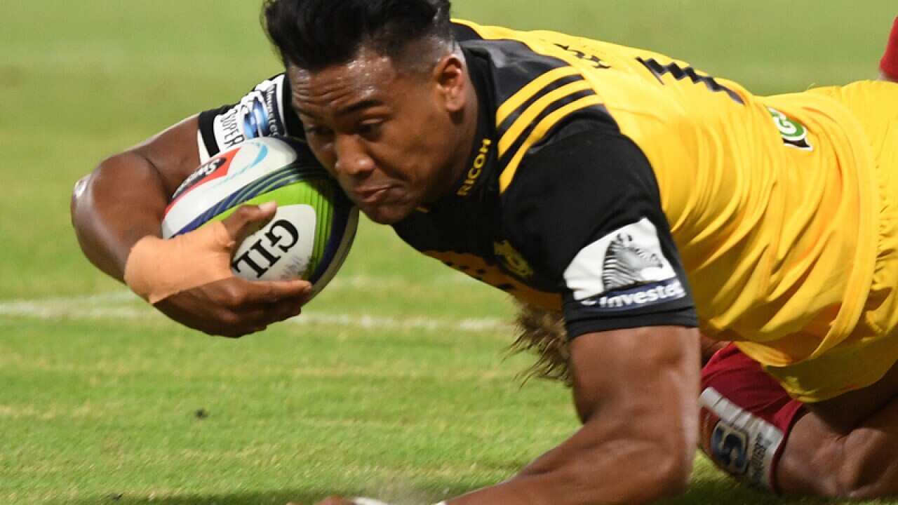 Hurricanes player Julian Savea crosses over to score