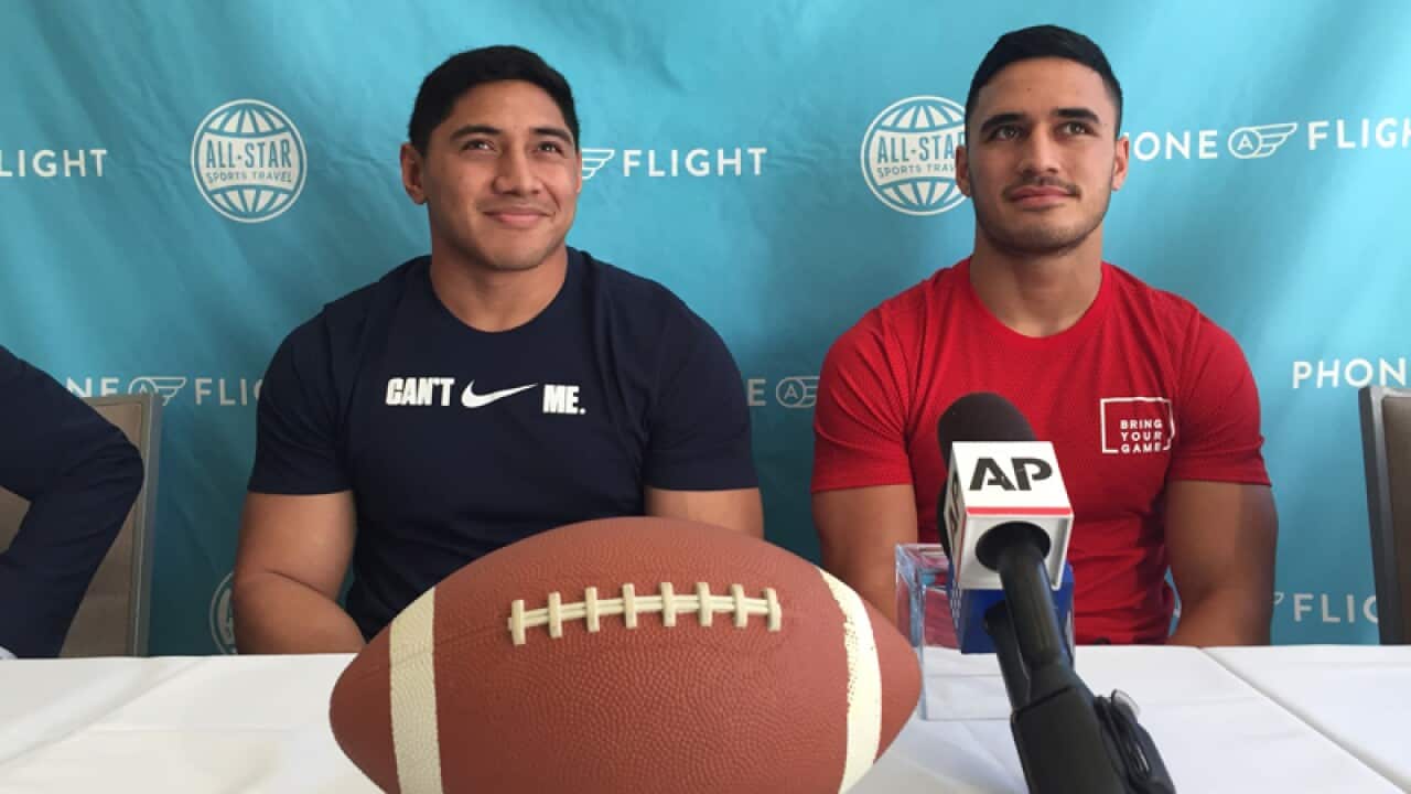 Jason Taumalolo (left) and Valentine Holmes