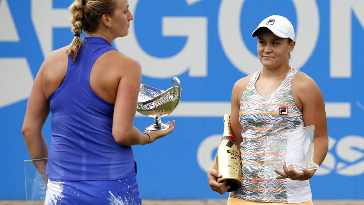 Czech tennis player Petra Kvitova (L) and Australia's Ashleigh Barty