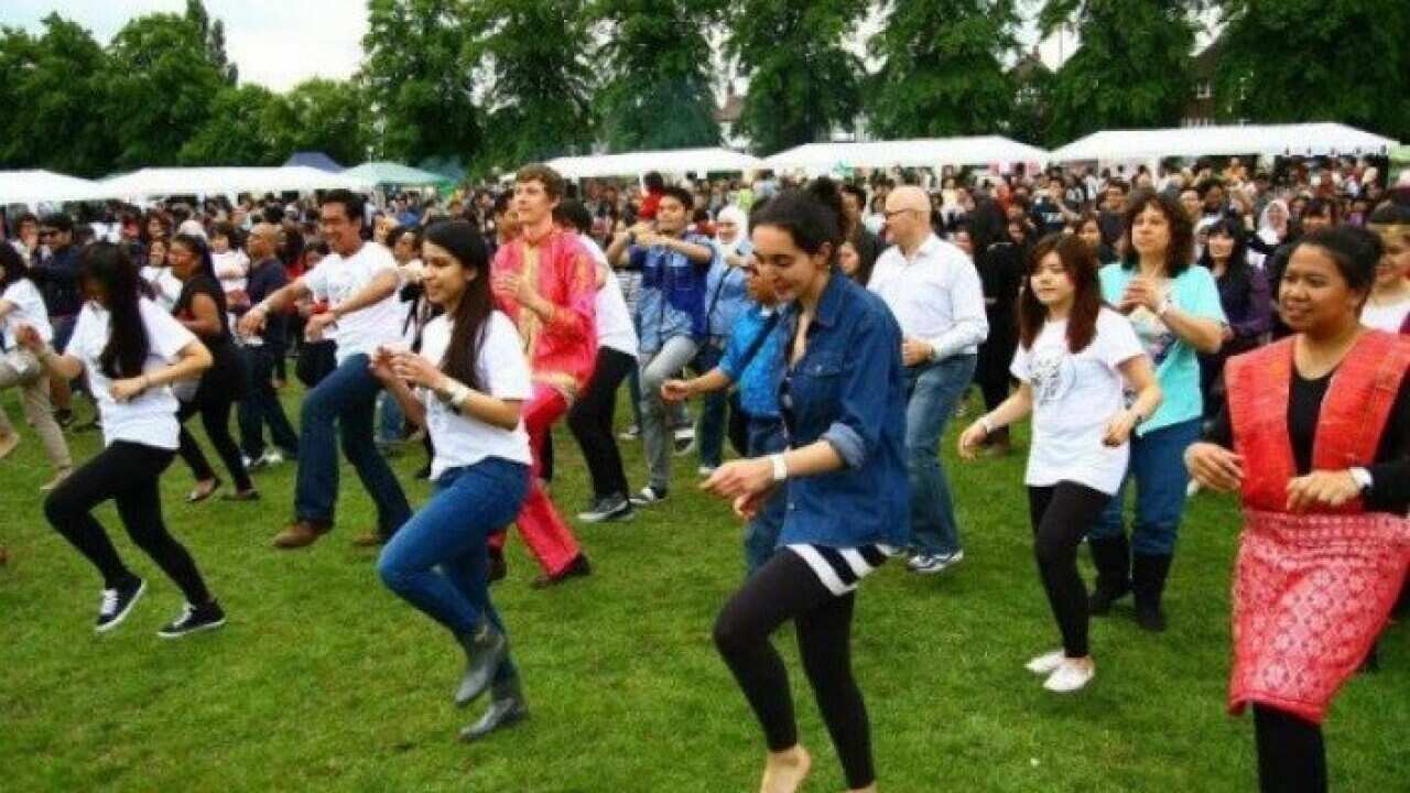 Visitors join Indonesians to do the Poco-Poco in Austria.