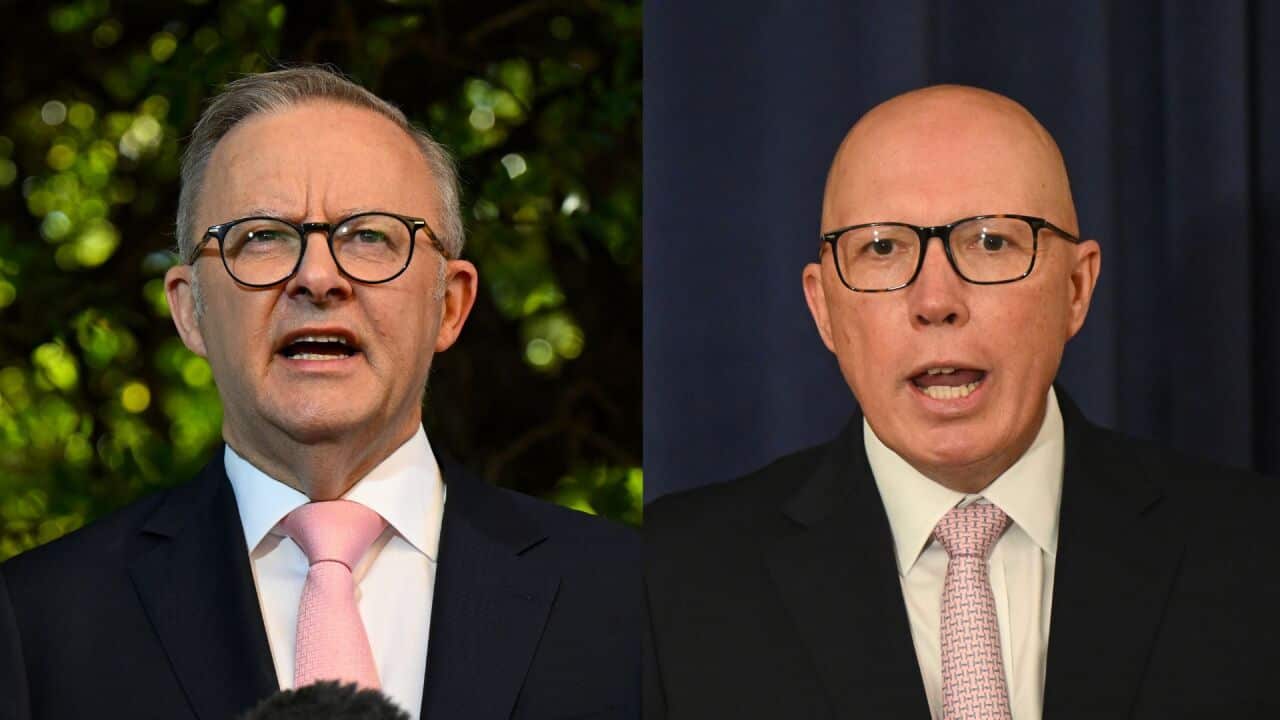 A composite image of two men in suits.