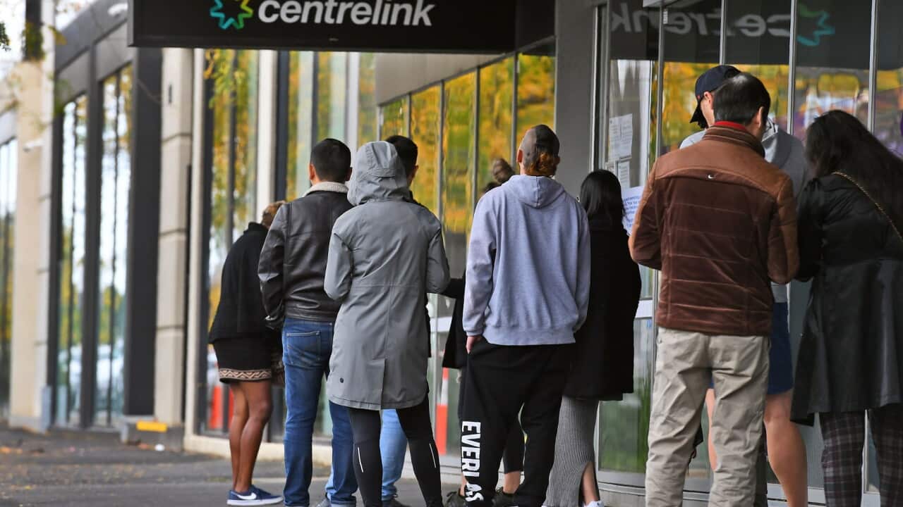 People queue up outisde a Centrelink office