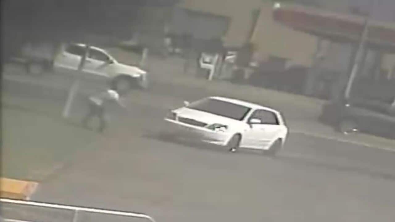 Police are appealing for information after a man was hit by a car in Kilsyth, west of Melbourne, before he crawled and got into the passenger seat.