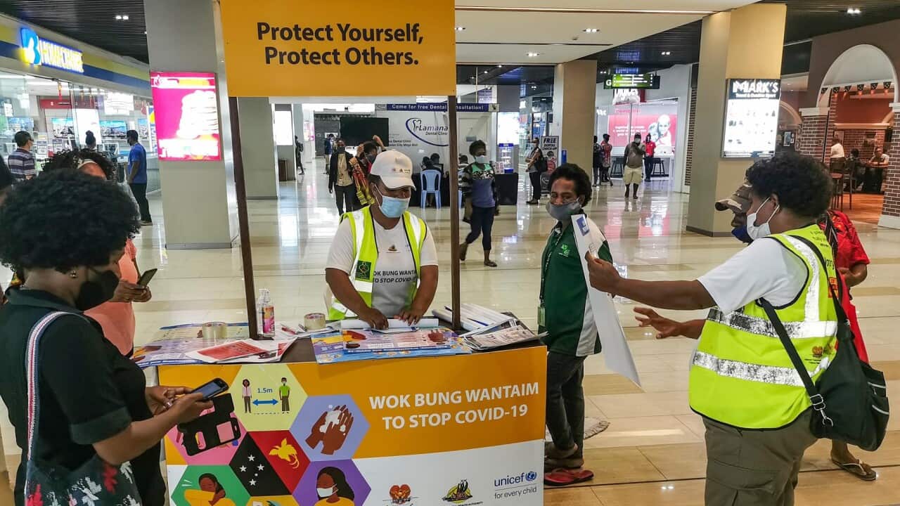 A COVID-19 information booth at a shopping centre in Port Moresby