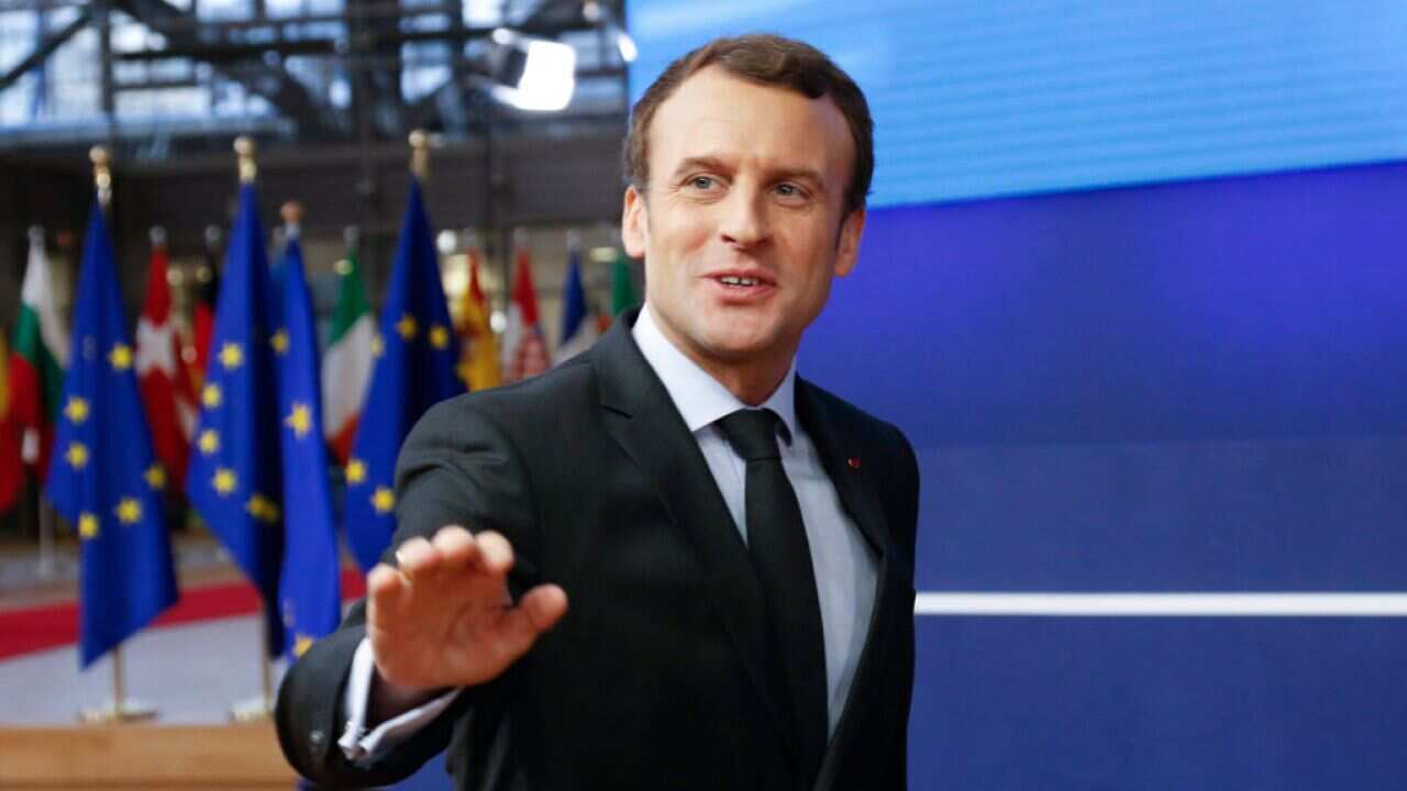 French President Emmanuel Macron arrives in Brussels for the European Council summit on 14 December 2017.
