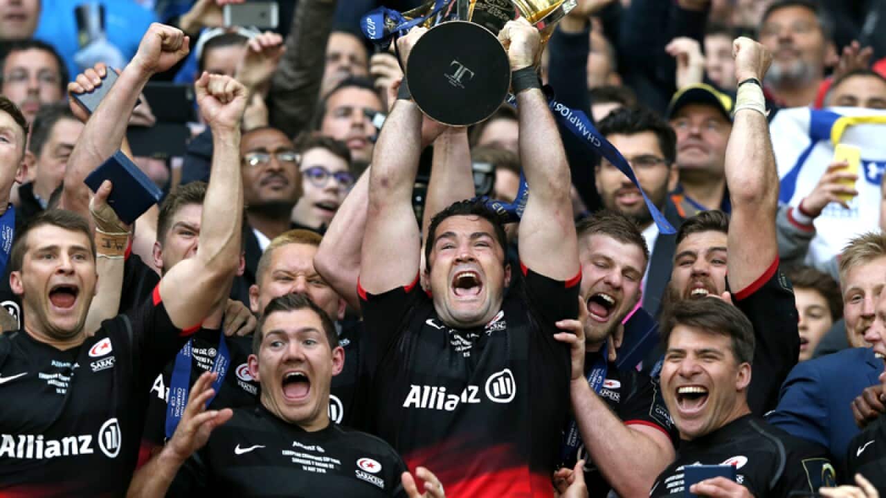 Saracens' Brad Barritt lifts the European Champions Cup trophy
