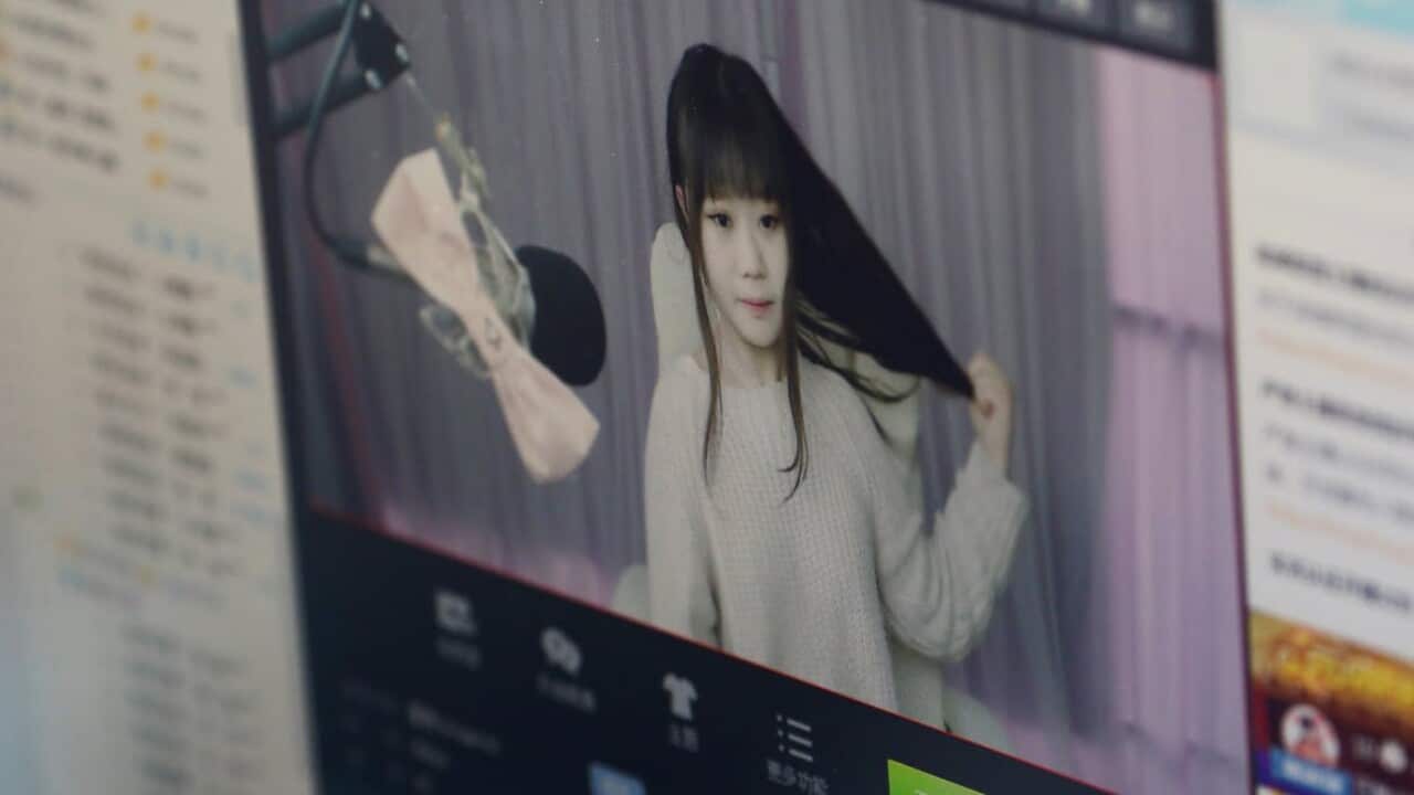 A girl broadcasts at Three Minute TV, a live streaming talent agency in Beijing.