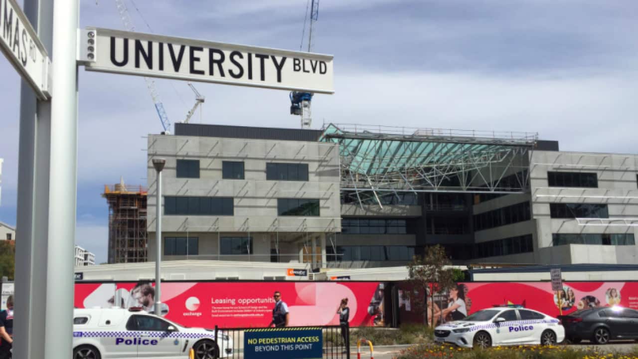 A roof collapsed at a construction site at Curtin University in Perth on Tuesday, killing one young worker and injuring two others.