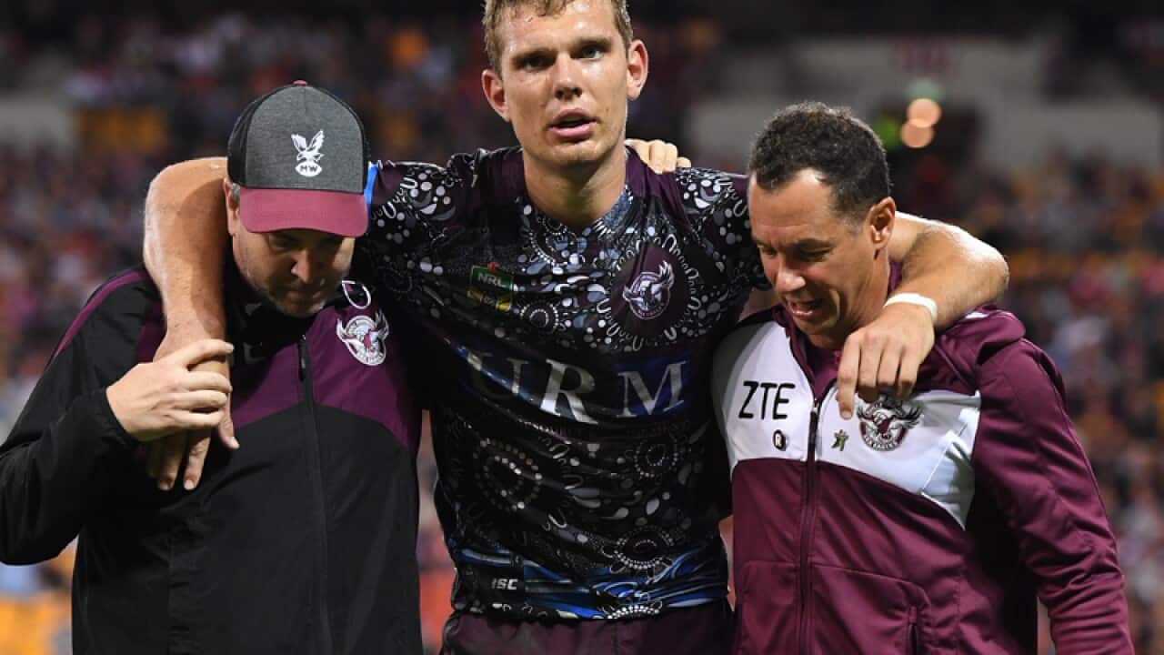 Thomas Trbojevic is taken from the field after an injury