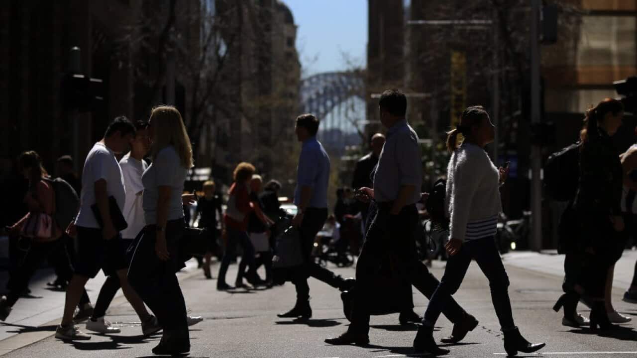 People walk on the streets of the CBD in Sydney, Wednesday, September 4, 2019