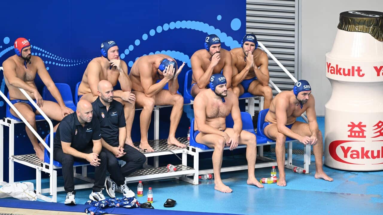 Members of team Serbia react during the Men Water Polo Bronze medal match against Greece at the World Championships in Singapore 2025