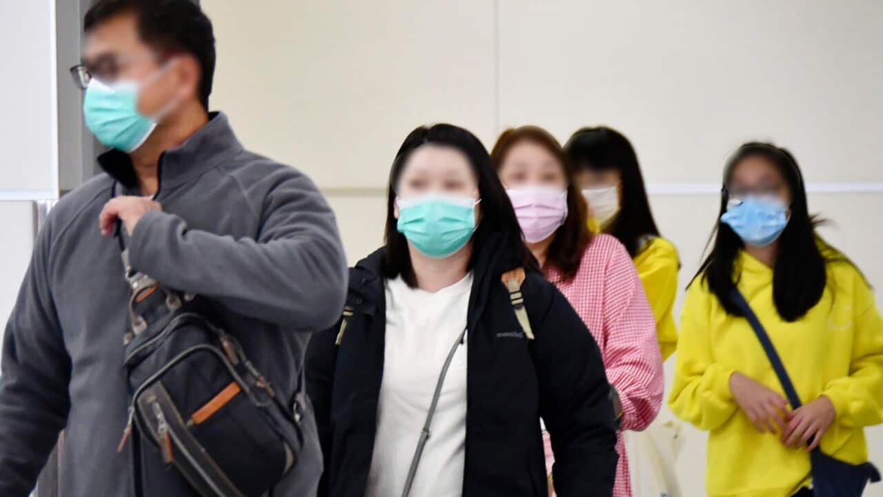 Travellers have donned face masks in a bid to better protect themselves from the coronavirus.