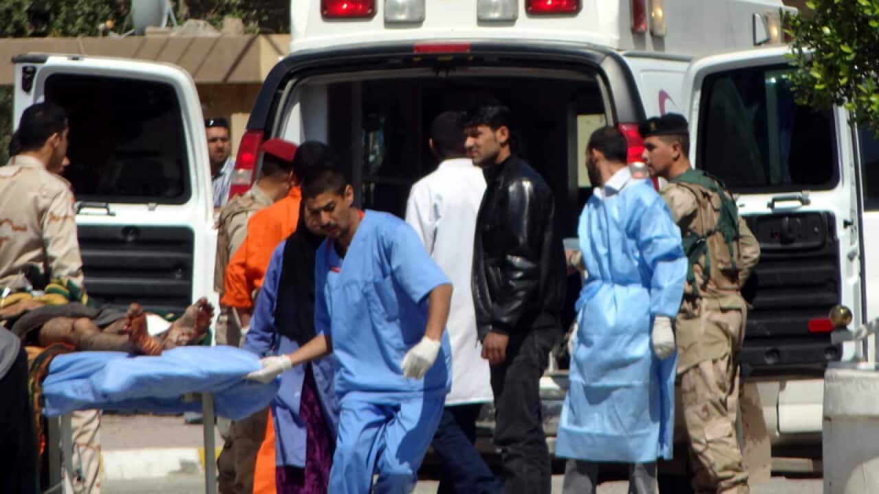 Two Iraq ministers quit after deadly clash