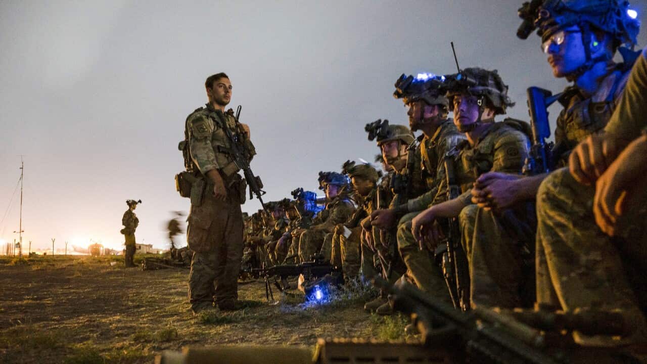 Some of the last US soldiers to leave Afghanistan prepare to board their plane