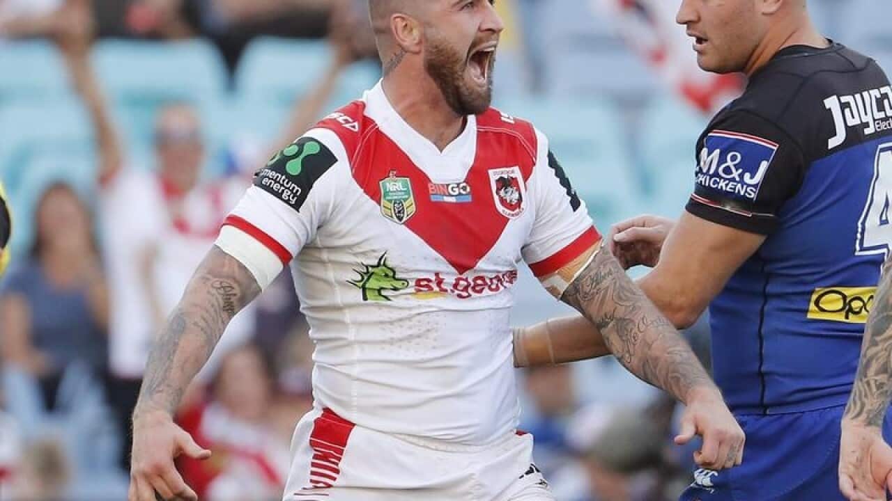 Joel Thompson reacts after scoring a try