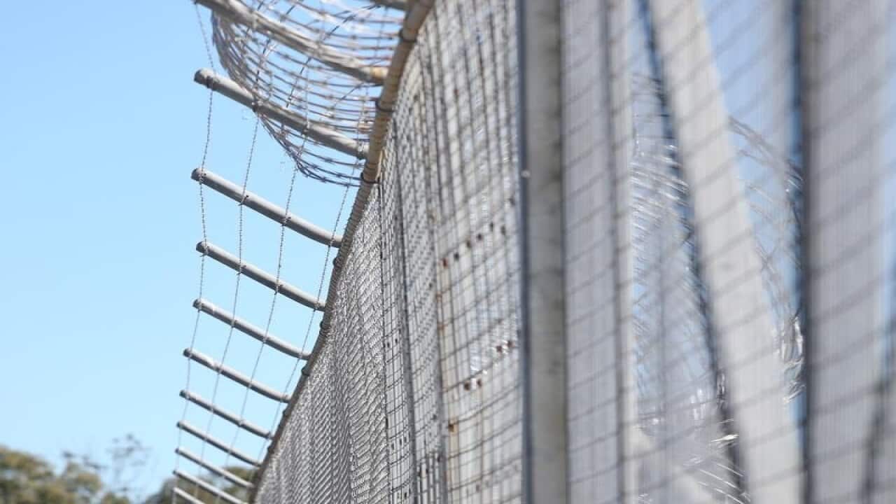 A representational image of a prison.